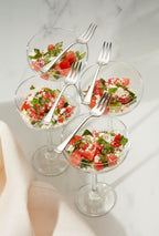 Set of four specialty forks for appetizers and desserts