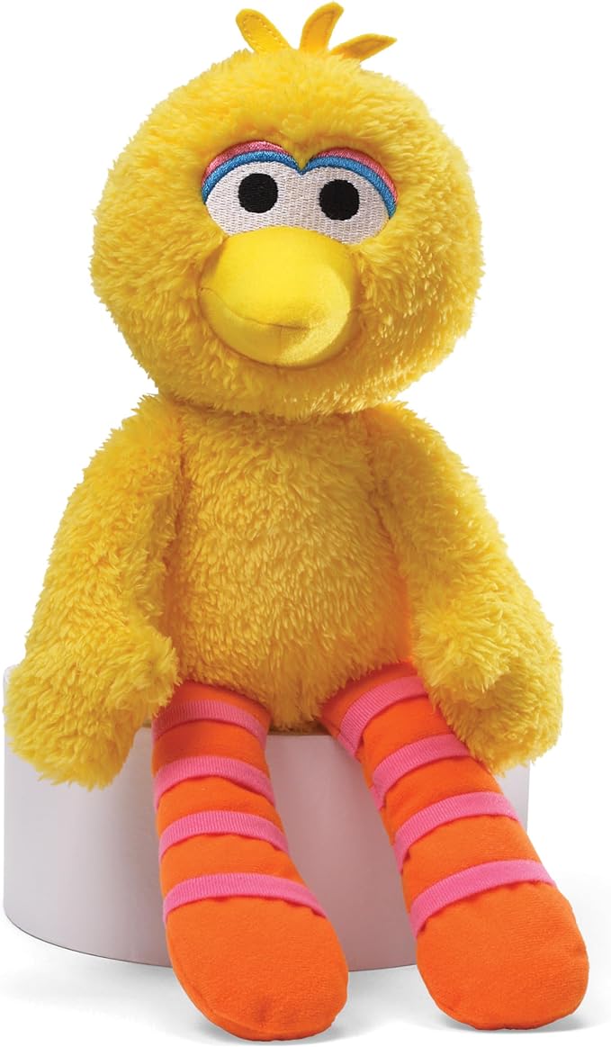 Soft Elmo stuffed animal with floppy limbs