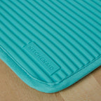 Ribbed soft silicone pot holder with cotton backing