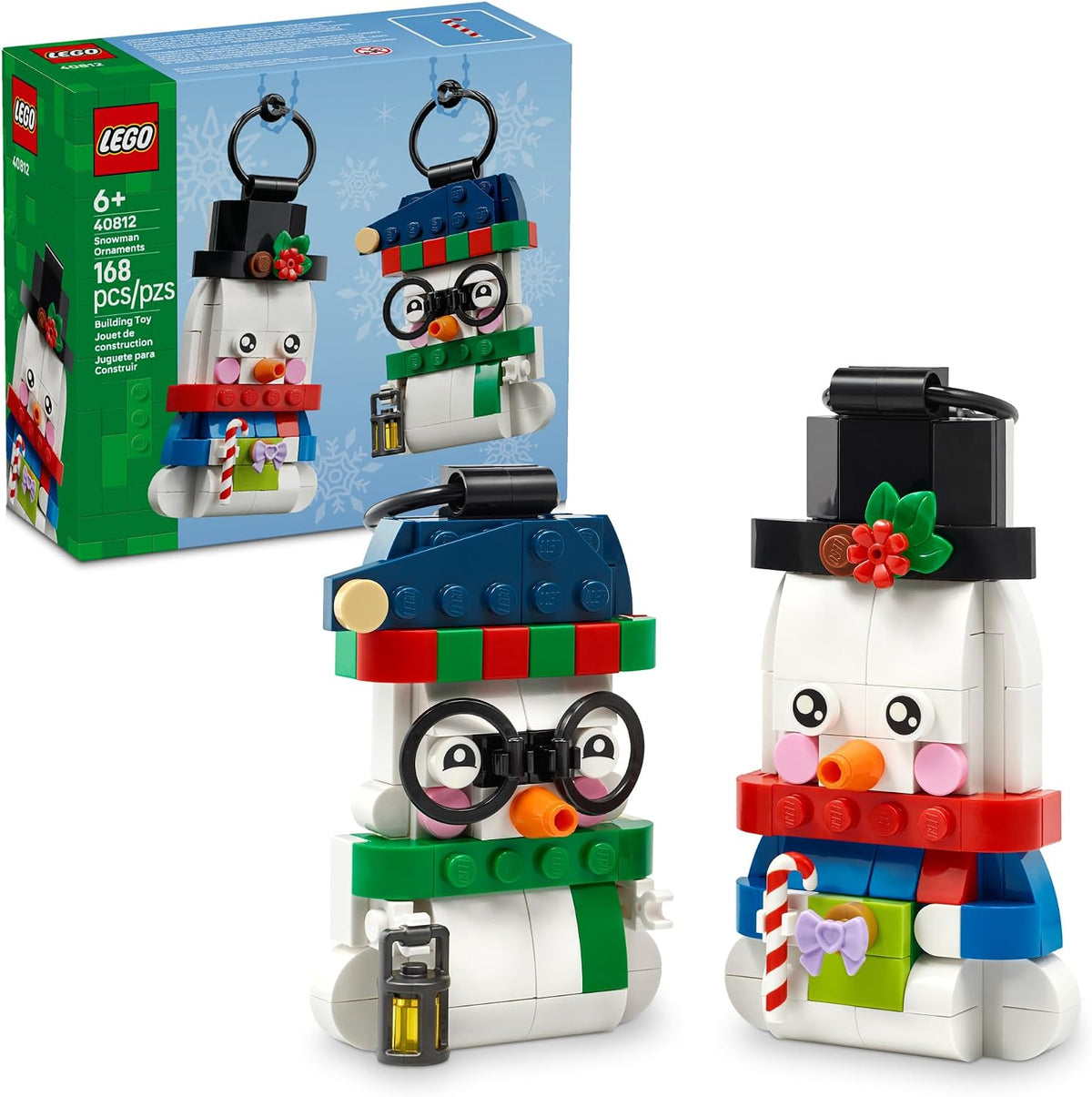 Two LEGO snowman Christmas ornaments with festive details