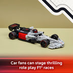 Detailed LEGO race car model with sponsor logos