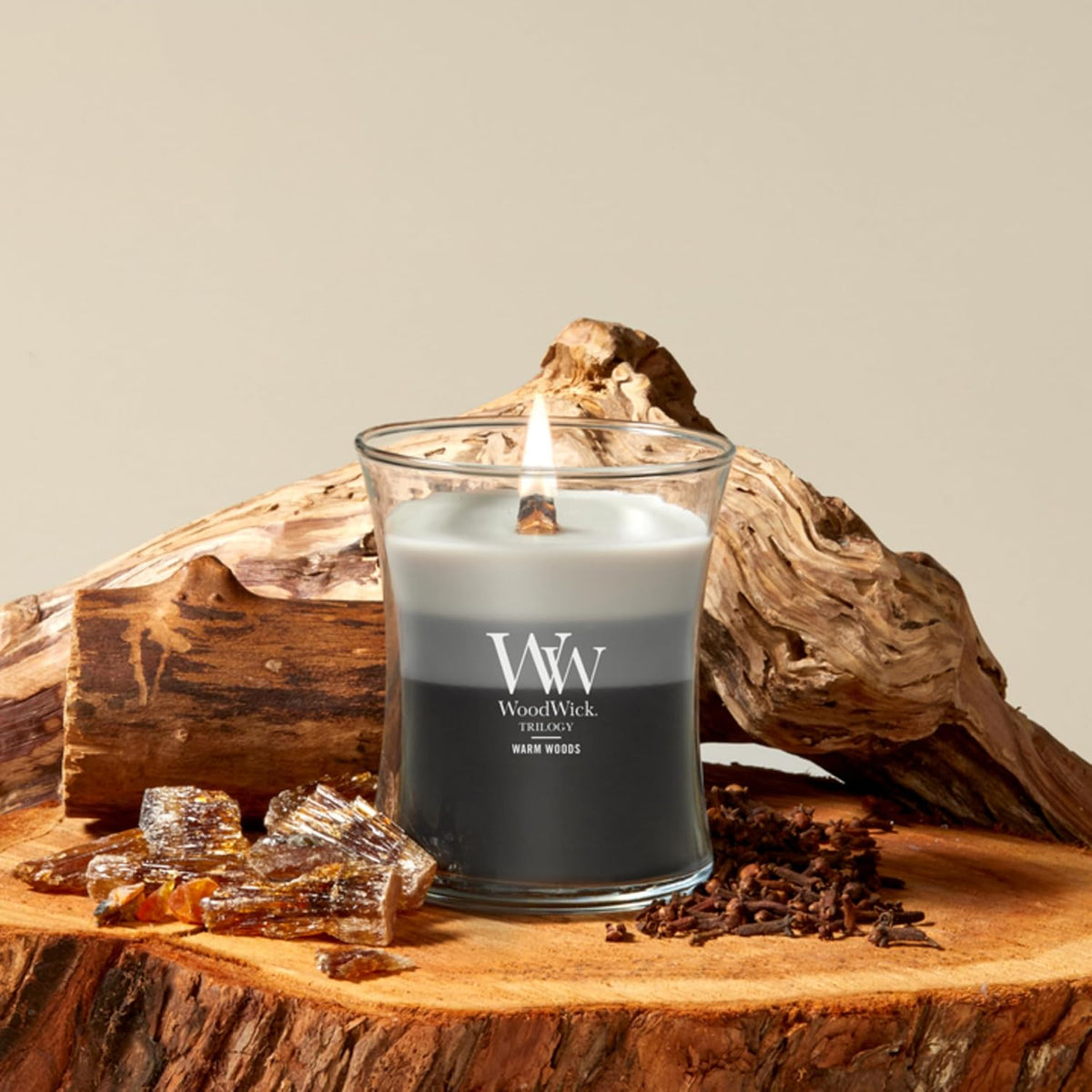 Warm woods layered fragrance candle by WoodWick