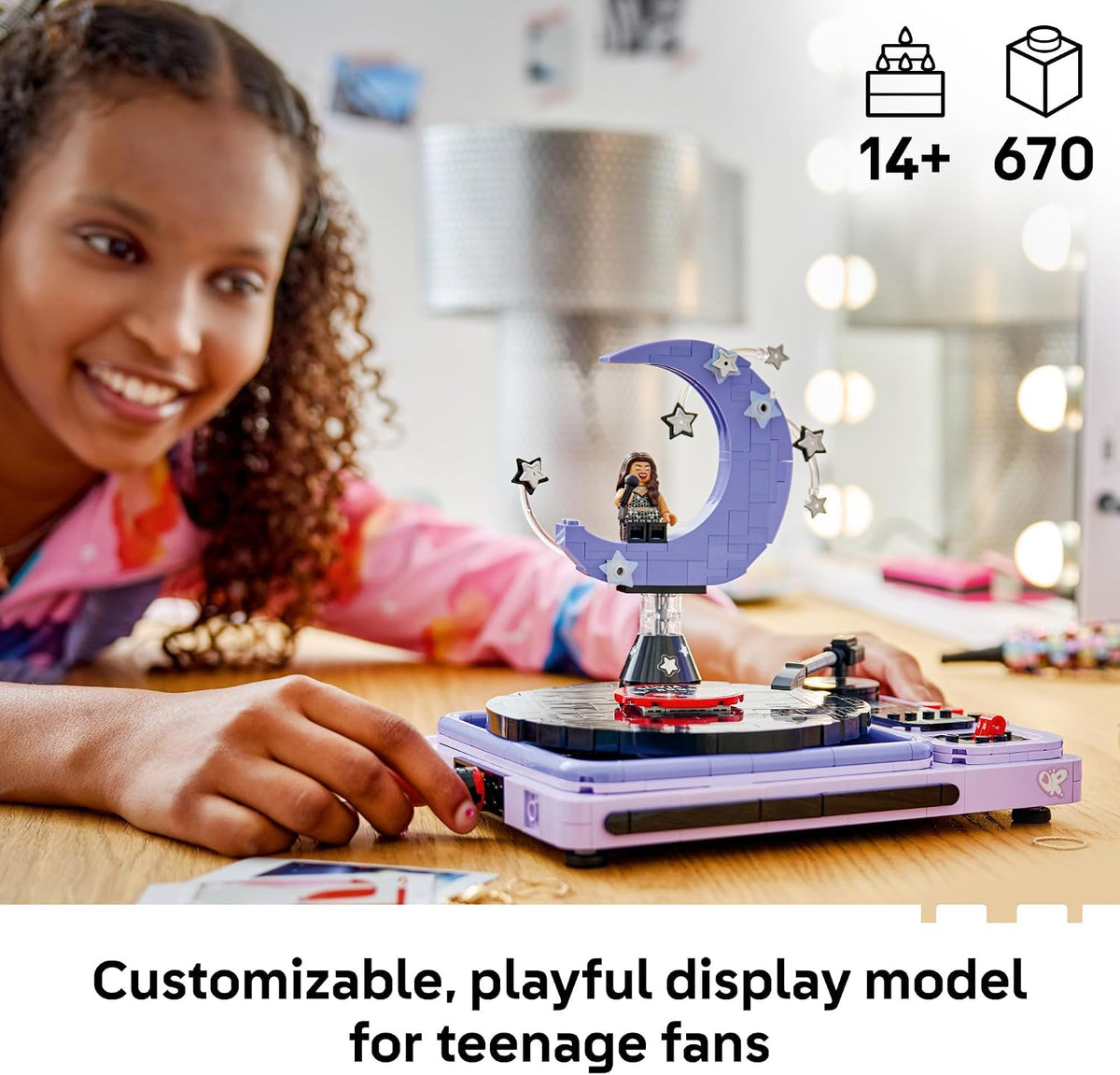 Purple toy record player with spinning vinyl