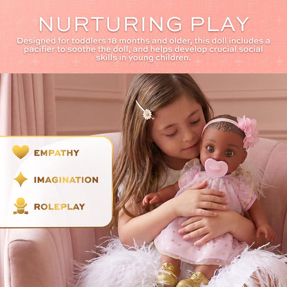 FAO Schwarz baby doll with pacifier and accessories