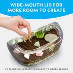 National Geographic terrarium kit with dinosaur figures and gemstones