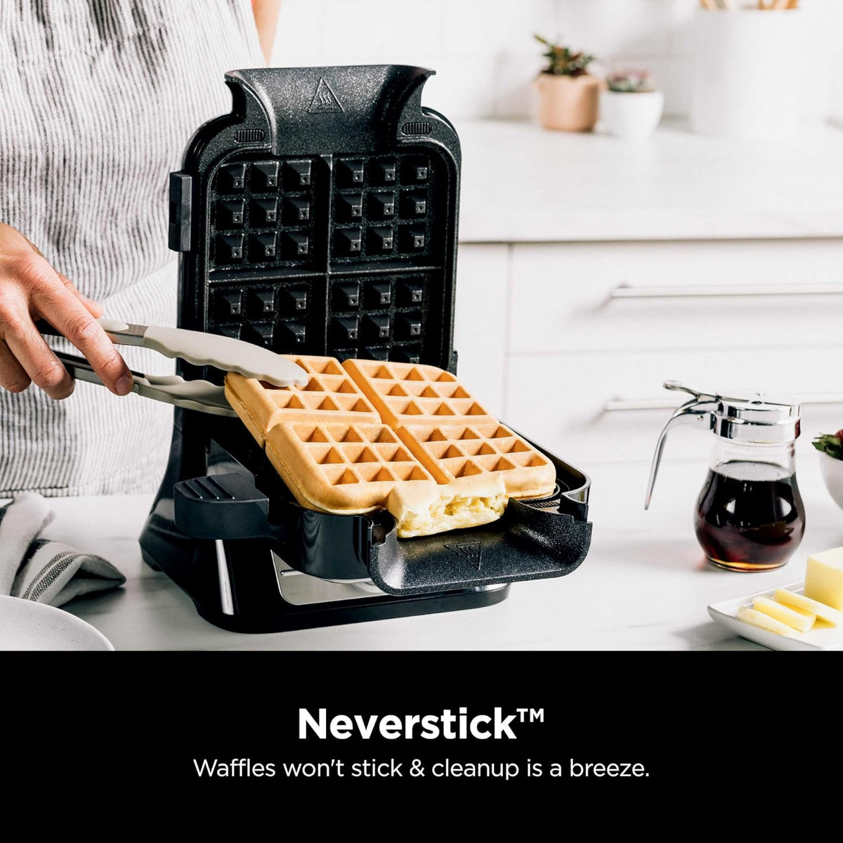 Black countertop waffle maker with specialty setting