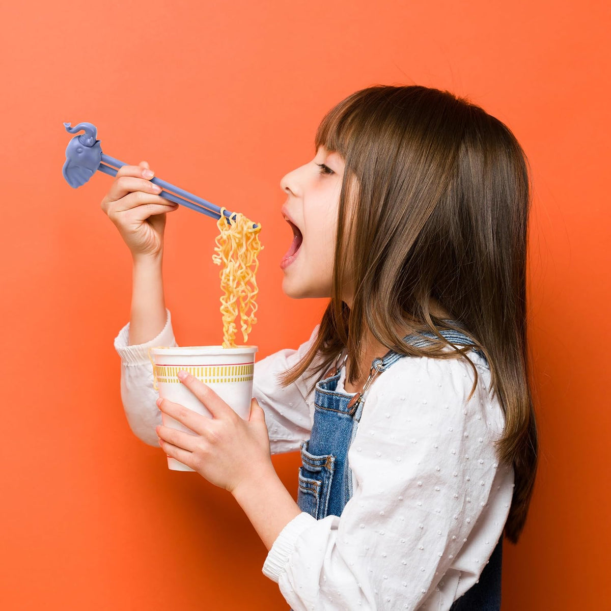 Reusable hinged chopsticks for little hands