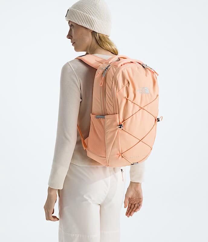 Calcite Sand Jester Luxe backpack with side pocket and straps
