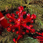 Red Christmas snowflake ornament with dimensional details