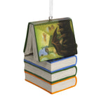 Harry Potter ornament featuring four stacked novels and a wand