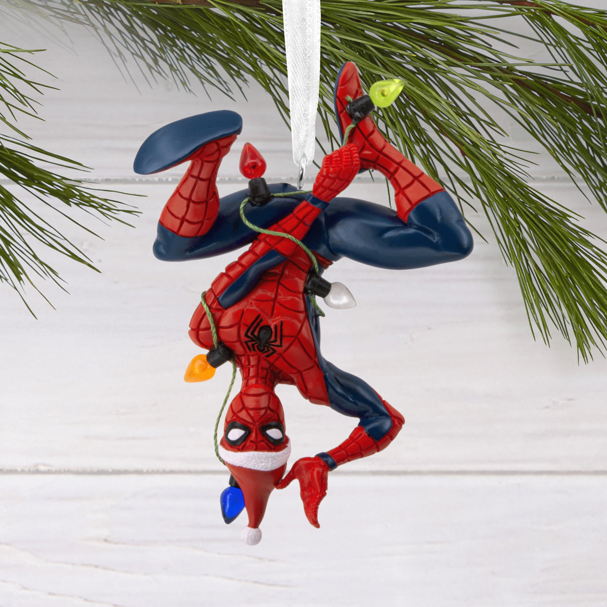 Hallmark Christmas ornament depicting Spider-Man in a Santa hat