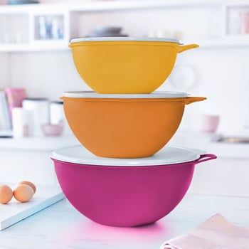 Blue nestable Tupperware bowls with leakproof lids
