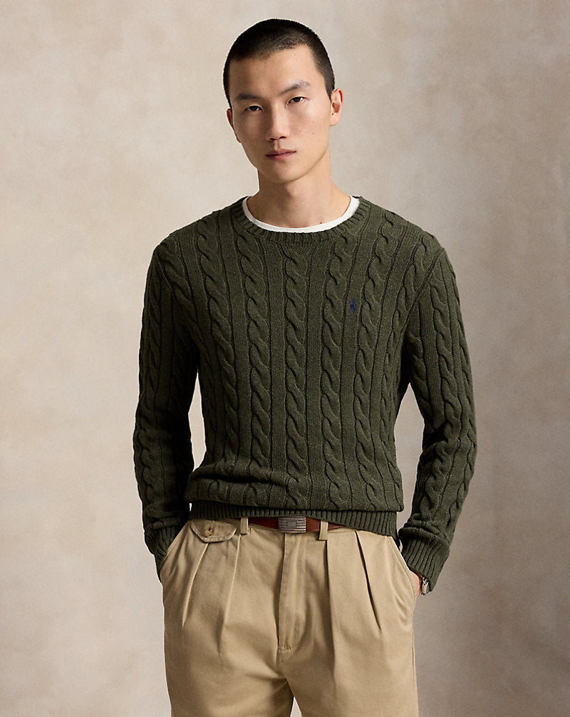 Soft cotton cable-knit sweater detail